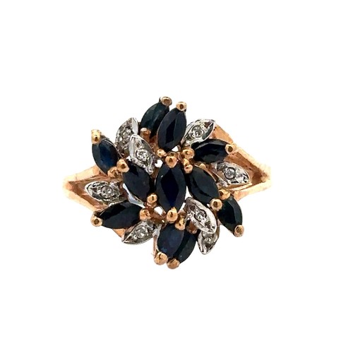 54 - A sapphire and diamond flower cluster ring, set in 9ct gold. Size P. Weight 3.41g.

Please see the b... 