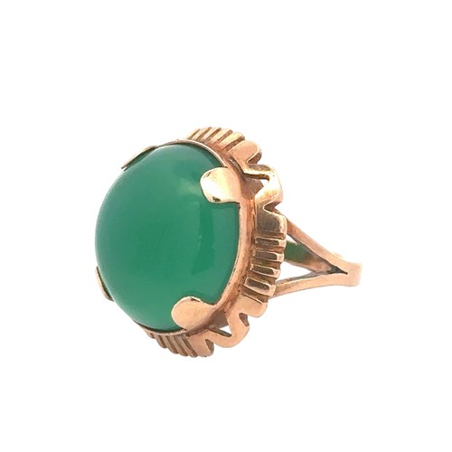 60 - A large green chalcedony dress ring with Polish hallmark for approx 14ct gold, (583). Size N/O.  Wei... 