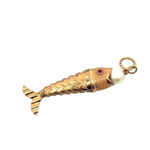 52 - A fish-shaped articulated pendant with a pearl in its mouth and pink gem set eyes.

Please see the b... 