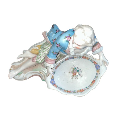 193 - Meissen, a late 19th Century Meissen figural sweetmeat / bonbon porcelain dish, modelled as a reclin... 