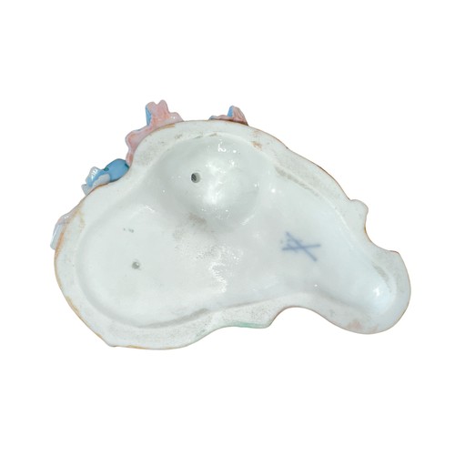 193 - Meissen, a late 19th Century Meissen figural sweetmeat / bonbon porcelain dish, modelled as a reclin... 