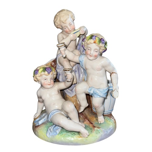 214 - 19th / 20th Century Allegorical Porcelain figural Putti group, toasting glasses and sat on a tree tr... 