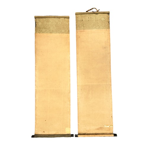 294 - Pair of Japanese hand decorated hanging scrolls, each with a vertical landscape design featuring a w... 