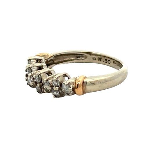 89 - A diamond ring with 13 diamonds set in 9ct gold, size K. London hallmarks. Diamond weight approx 0.4... 