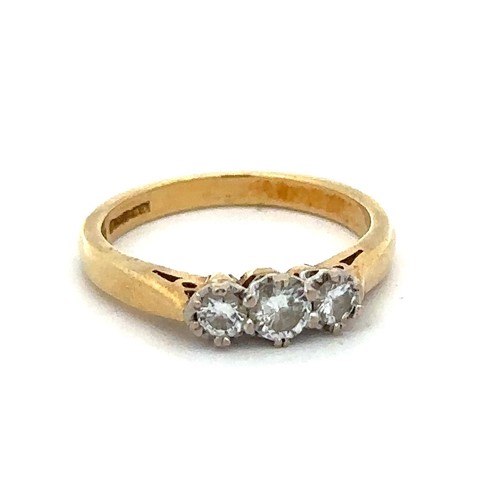 8 - A hallmarked yellow 18ct gold and three stone diamond ring, size I. Diamond weight approx 0.3ct. Wei... 