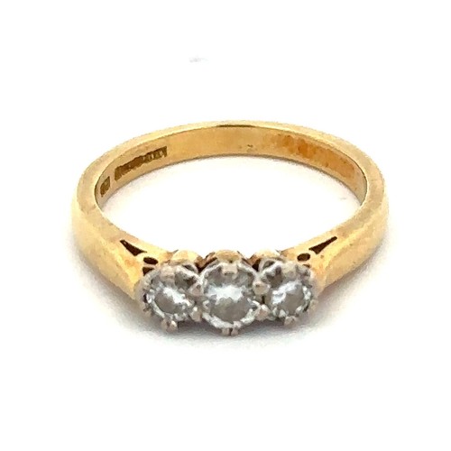 8 - A hallmarked yellow 18ct gold and three stone diamond ring, size I. Diamond weight approx 0.3ct. Wei... 