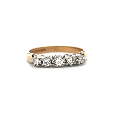 72 - A five stone diamond ring set in 9ct yellow gold with a white gold gallery, size P. Diamond weight a... 