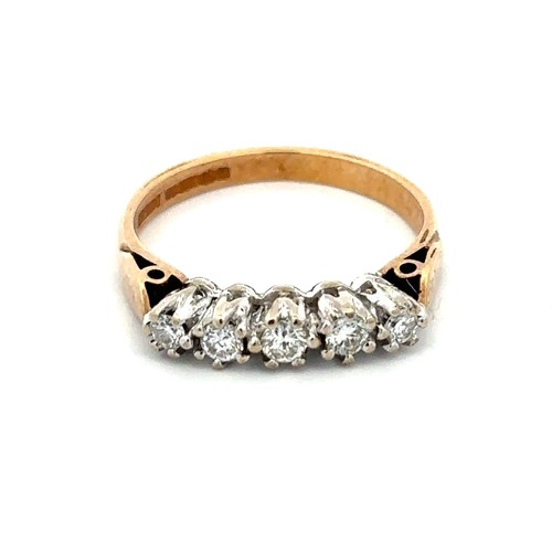 72 - A five stone diamond ring set in 9ct yellow gold with a white gold gallery, size P. Diamond weight a... 