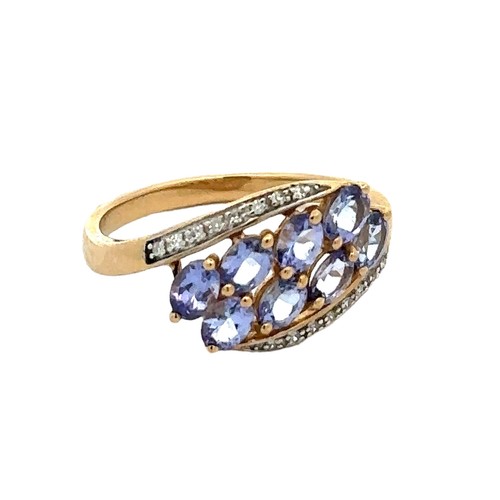 73 - A hallmarked 9ct gold, tanzanite and diamond ring, size P. Weight 2.52g.
Good condition overall. Sto... 