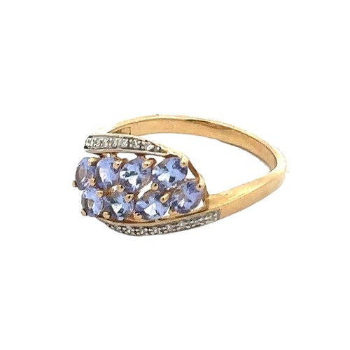 73 - A hallmarked 9ct gold, tanzanite and diamond ring, size P. Weight 2.52g.
Good condition overall. Sto... 