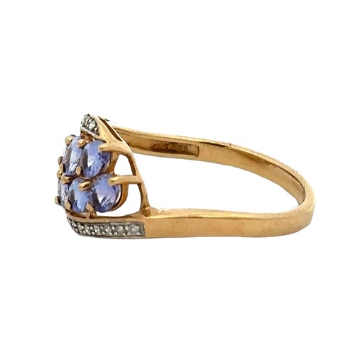 73 - A hallmarked 9ct gold, tanzanite and diamond ring, size P. Weight 2.52g.
Good condition overall. Sto... 