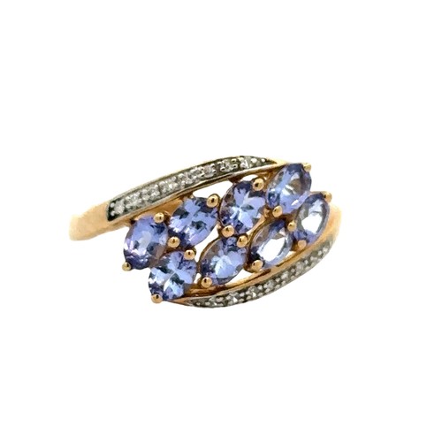 73 - A hallmarked 9ct gold, tanzanite and diamond ring, size P. Weight 2.52g.
Good condition overall. Sto... 