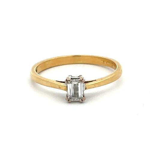 76 - An 18ct yellow gold and emerald cut diamond single stone ring.  Diamond approx 4.3mm x 3mm, 0.25ct. ... 