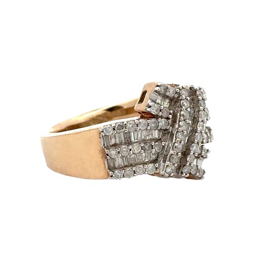 79 - A hallmarked 9ct gold and diamond dress ring set with round and baguette cut diamonds, size O,  Weig... 