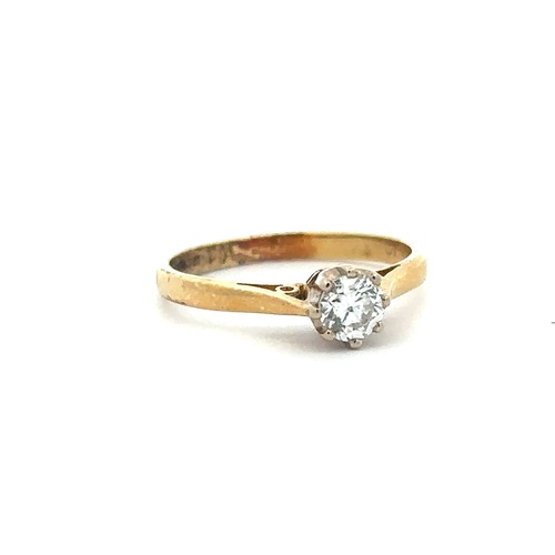 82 - A hallmarked 18ct yellow gold diamond solitaire ring of approx 0.25ct, size H. Weight 1.72g.

Please... 