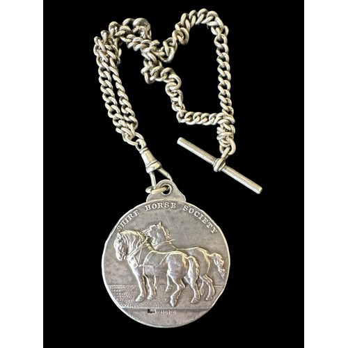 127 - A silver Shire Horse Society medal with 1938 Birmingham hallmarks for Mappin & Webb.  On one side tw... 