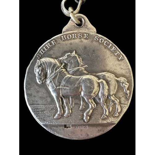 127 - A silver Shire Horse Society medal with 1938 Birmingham hallmarks for Mappin & Webb.  On one side tw... 