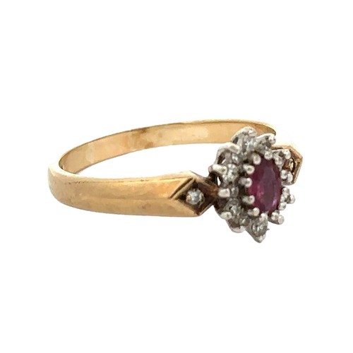 84 - A ruby and diamond cluster ring with diamond accents in the shoulders, size Q. Hallmarked 9ct yellow... 