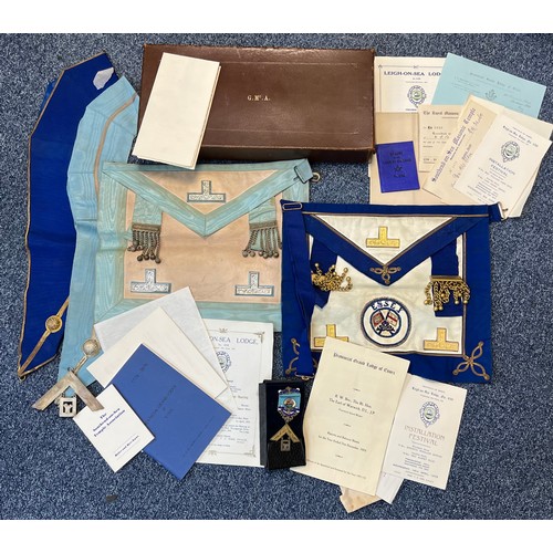 182 - Freemasons Masonic items to include; a brown leather case marked G.Mc.A., a pair of aprons, a pair o... 