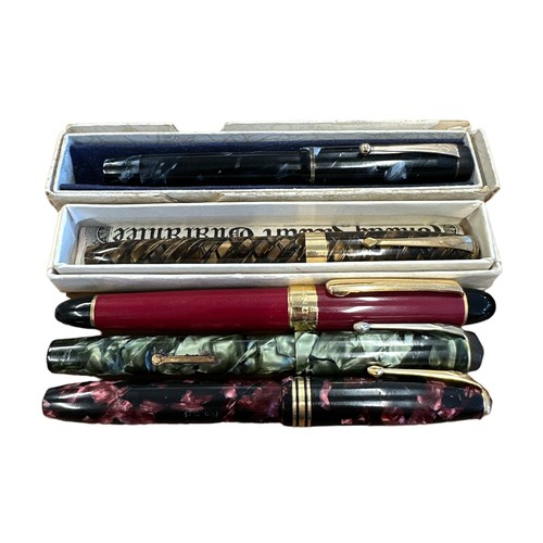 344 - Four Conway Stewart Fountain Pens with 14 carat gold nibs two boxed. One German pen. 5 in total