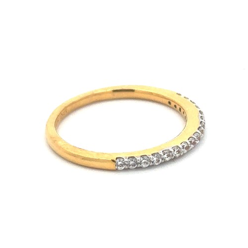 27 - Half-eternity CZ ring, size O. Weight 2.93g. Stamped 916 (22ct).
Good condition. Light surface abras... 