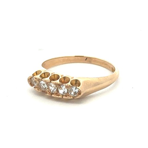 39 - A  paste five stone ring, size L, stamped 14K. Weight 2.88g. Paste stone with small chips and wear.
... 