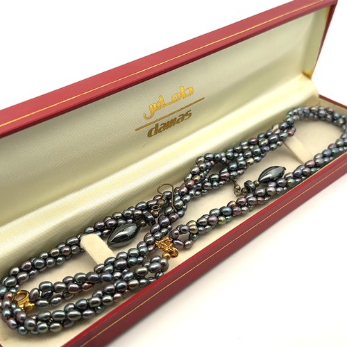 29 - A boxed Damas rope twist pearl necklace and bracelet set with matching earrings (not pearl).

Please... 