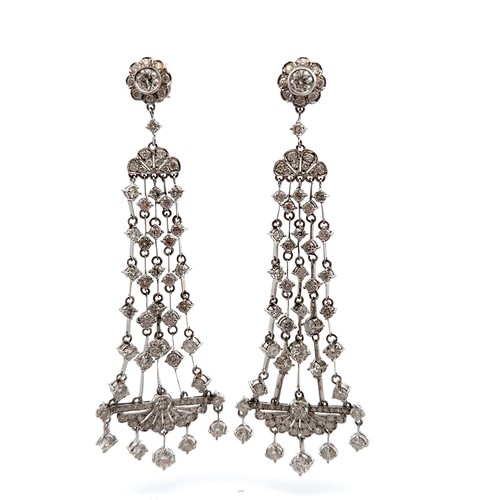 44 - A stunning pair of Art Deco diamond chandelier earrings, mounted in platinum.  Approx 14.4ct of natu... 