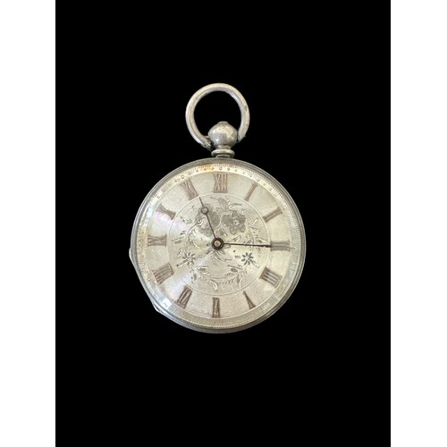 103 - A small silver open face key-wind pocket watch. Silver dial with foliate decoration, Case diameter 3... 