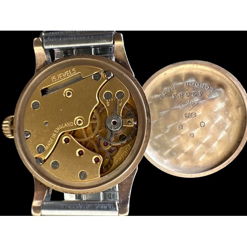 109 - A Smiths De Luxe 15 jewel 9ct gold watch, No. C255167. Case approx 31mm diameter, Arabic numerals at... 