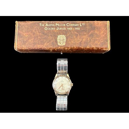 109 - A Smiths De Luxe 15 jewel 9ct gold watch, No. C255167. Case approx 31mm diameter, Arabic numerals at... 