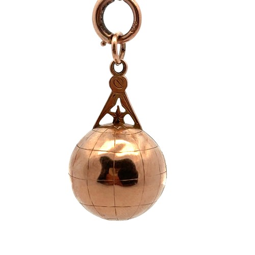 175 - A rare 9ct gold Masonic fob/ orb pendant. The engraved hinged orb opens to reveal four hinged gold s... 