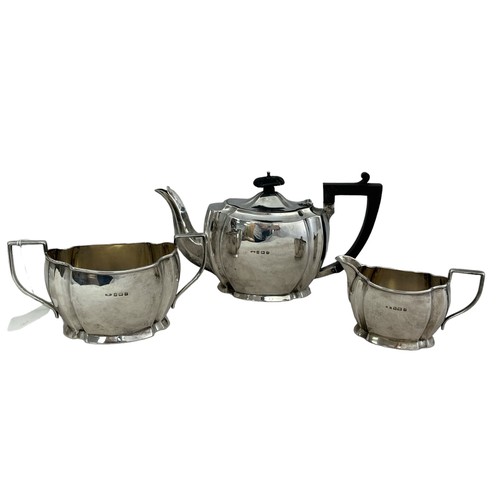 124 - A three piece silver tea service by Hobson, James & Gilby, comprising of a teapot (with loose finial... 