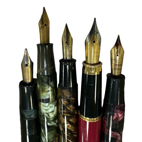 344 - Four Conway Stewart Fountain Pens with 14 carat gold nibs two boxed. One German pen. 5 in total