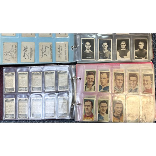 296 - A collection of football cigarette cards, mainly complete sets in plastic sleeves, in two albums, in... 