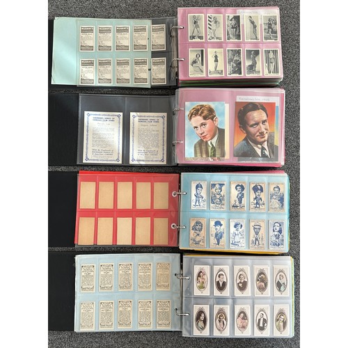 297 - A collection of cigarette cards, mainly complete sets, sleeved in four albums, in good to excellent ... 