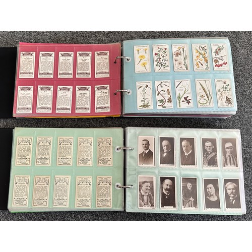 297 - A collection of cigarette cards, mainly complete sets, sleeved in four albums, in good to excellent ... 