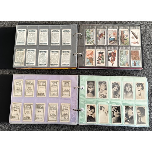 297 - A collection of cigarette cards, mainly complete sets, sleeved in four albums, in good to excellent ... 