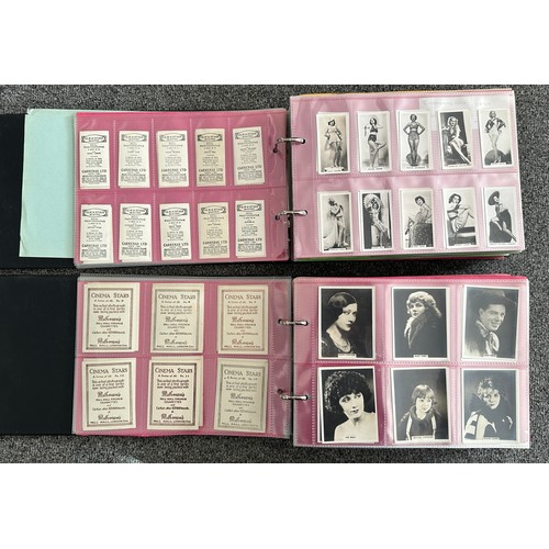 297 - A collection of cigarette cards, mainly complete sets, sleeved in four albums, in good to excellent ... 