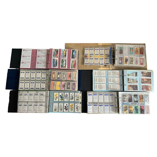 368 - A collection of trade cards, sleeved in 6 albums plus some loose in a box, generally in very good to... 