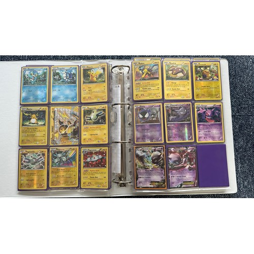 394 - Folder containing near complete XY Breakthrough & XY Break Point sets of Pokemon cards. Cards includ... 