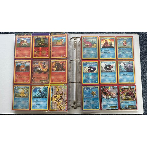 394 - Folder containing near complete XY Breakthrough & XY Break Point sets of Pokemon cards. Cards includ... 