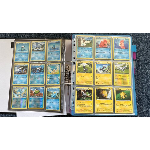 397 - Folder containing Pokemon cards from Black & White series. 2x complete sets are Black & White series... 