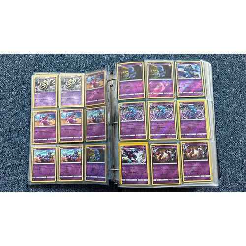 403 - A folder containing duplicates of Pokemon cards. Various sets and series including Base Set, Ultra P... 