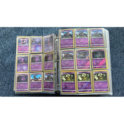 403 - A folder containing duplicates of Pokemon cards. Various sets and series including Base Set, Ultra P... 