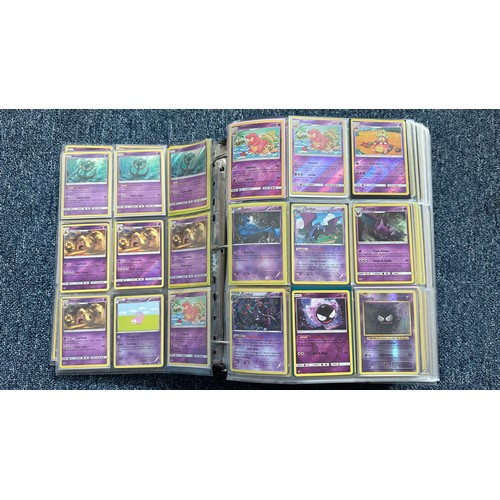 403 - A folder containing duplicates of Pokemon cards. Various sets and series including Base Set, Ultra P... 