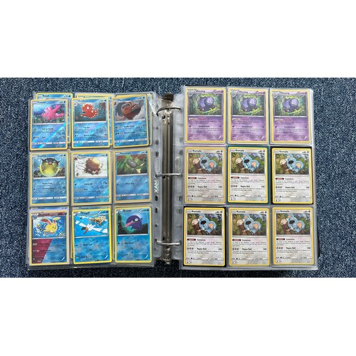 403 - A folder containing duplicates of Pokemon cards. Various sets and series including Base Set, Ultra P... 