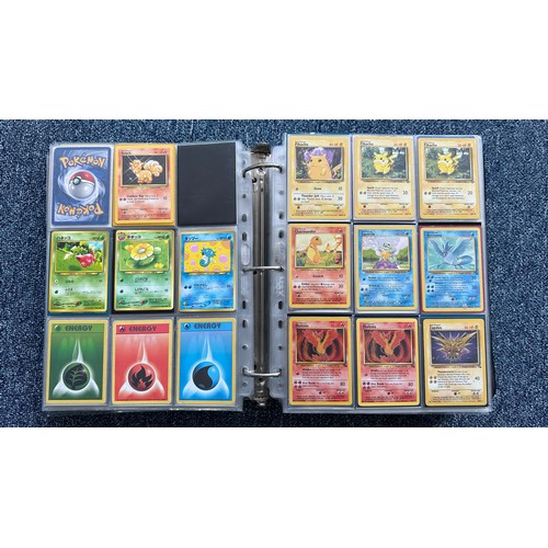 403 - A folder containing duplicates of Pokemon cards. Various sets and series including Base Set, Ultra P... 