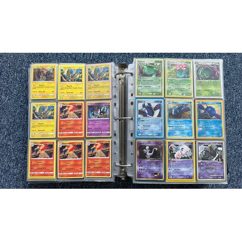 403 - A folder containing duplicates of Pokemon cards. Various sets and series including Base Set, Ultra P... 