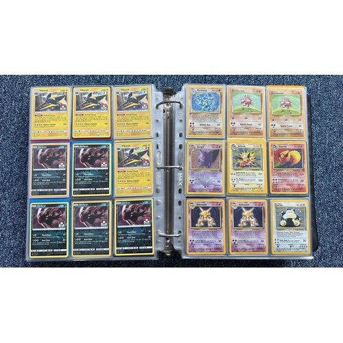 403 - A folder containing duplicates of Pokemon cards. Various sets and series including Base Set, Ultra P... 